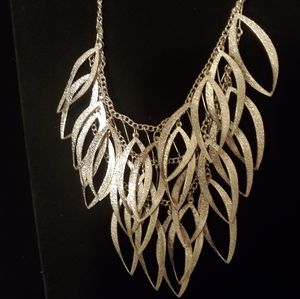 Silver toned  " school of fish " shaped necklace